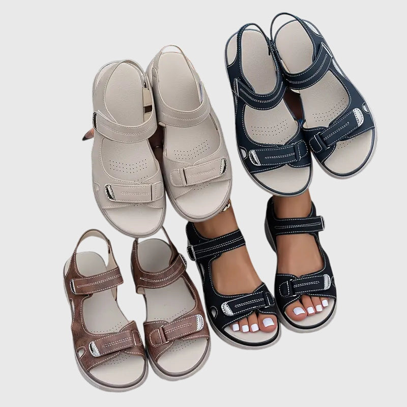 Black - Women's faux-leather platform sandals featuring dual hook-and-loop adjustable straps, contrast stitching details, and a thick shock-absorbing sole.