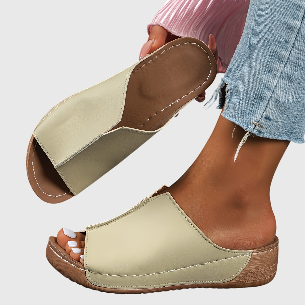 Khaki - Women's faux-leather slip-on wedge sandals featuring an open-toe design, contoured footbed, and detailed contrast stitching along the sole.