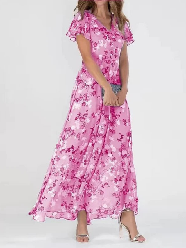 Dark Pink - A woman wearing a peach-colored floral print chiffon maxi dress with flutter sleeves and a V-neck, showcasing a fluid, sweeping skirt.