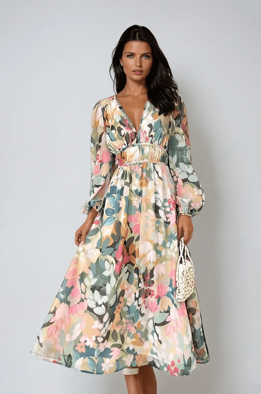 XL - A woman wearing a long-sleeved watercolor floral print chiffon maxi dress with a plunging V-neckline, ruched waistband, and balloon sleeves.