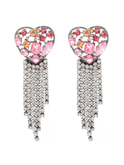Pink - Women's statement drop earrings featuring a heart-shaped top filled with pink and peach faceted stones, finished with a cascading clear rhinestone fringe.
