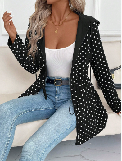 Black Polka - Women's mid-length red zip-up anorak jacket worn open to reveal a bold leopard print interior lining, featuring front pockets and an internal drawstring waist.