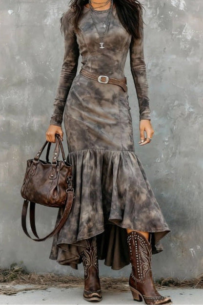 Grey - A woman wearing a long-sleeved, crewneck mini dress in a brown and grey tie-dye pattern, featuring vertical seams and a fitted silhouette.