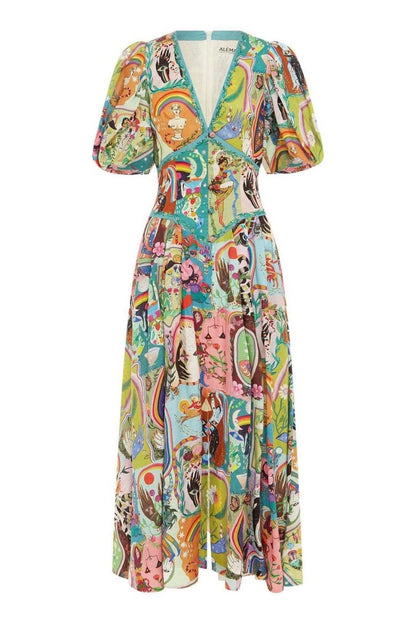 Woman in colorful printed cotton midi dress with puff sleeves