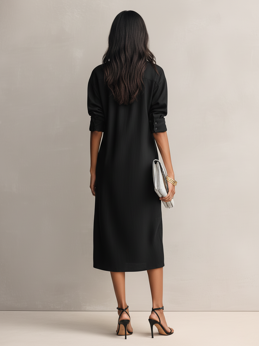 Apricot - Model wearing a relaxed fit, long-sleeve midi shirtdress with a collar, chest pockets, and side pockets against a neutral background.