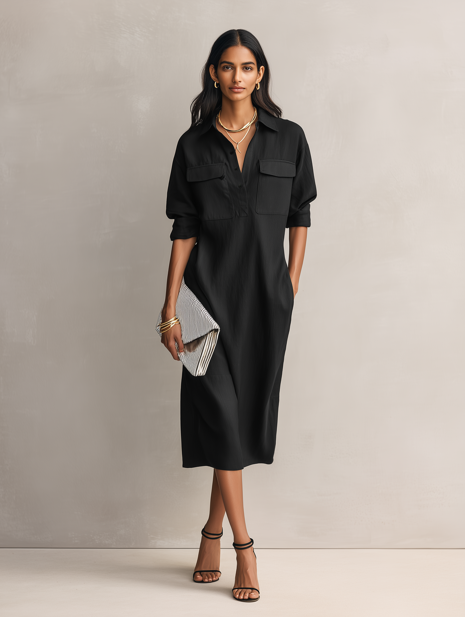 Apricot - Model wearing a relaxed fit, long-sleeve midi shirtdress with a collar, chest pockets, and side pockets against a neutral background.