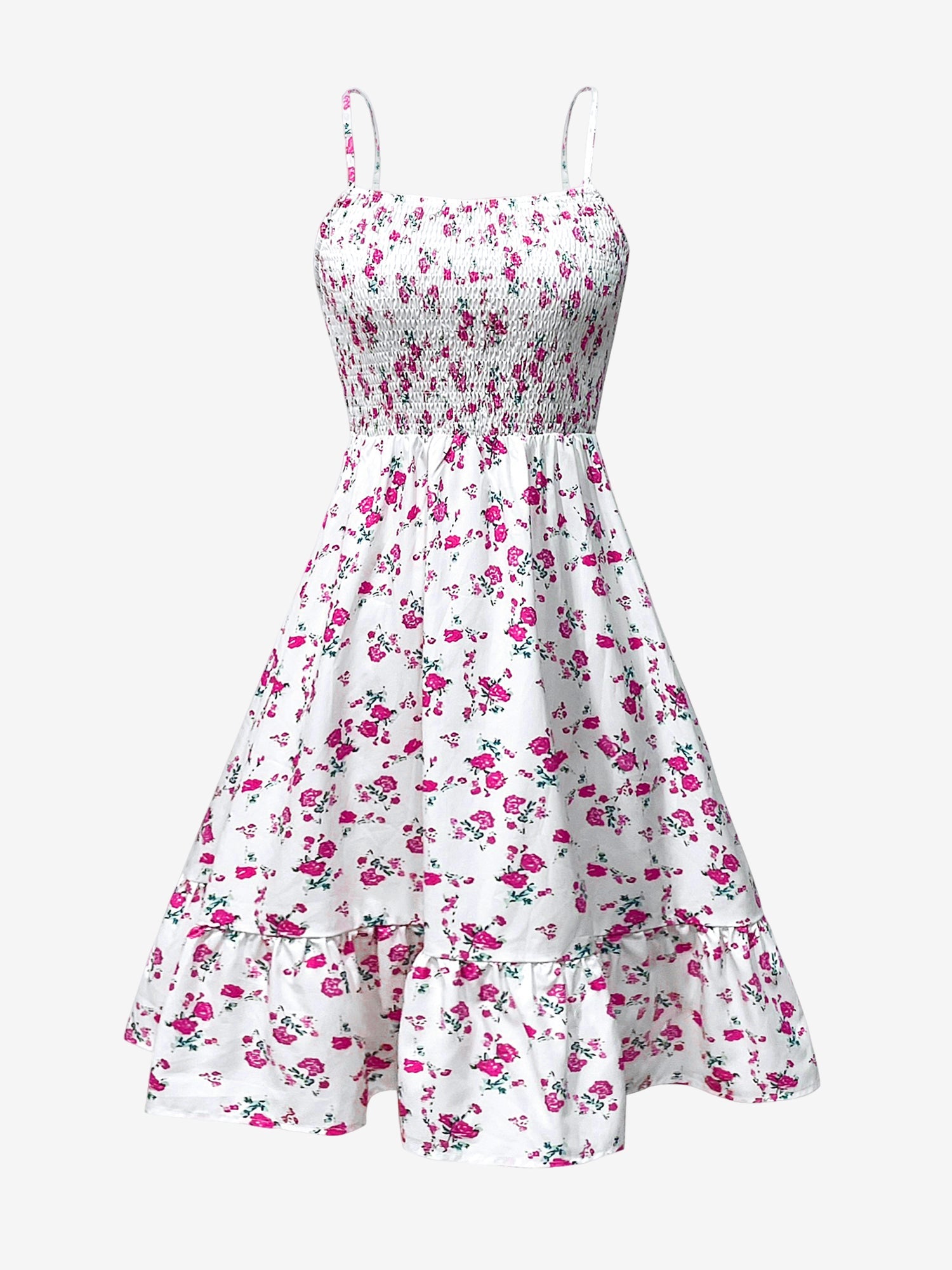 White - Woman wearing a floral print mini sundress with spaghetti straps, a smocked bodice, and a ruffle hem against a white textured wall
