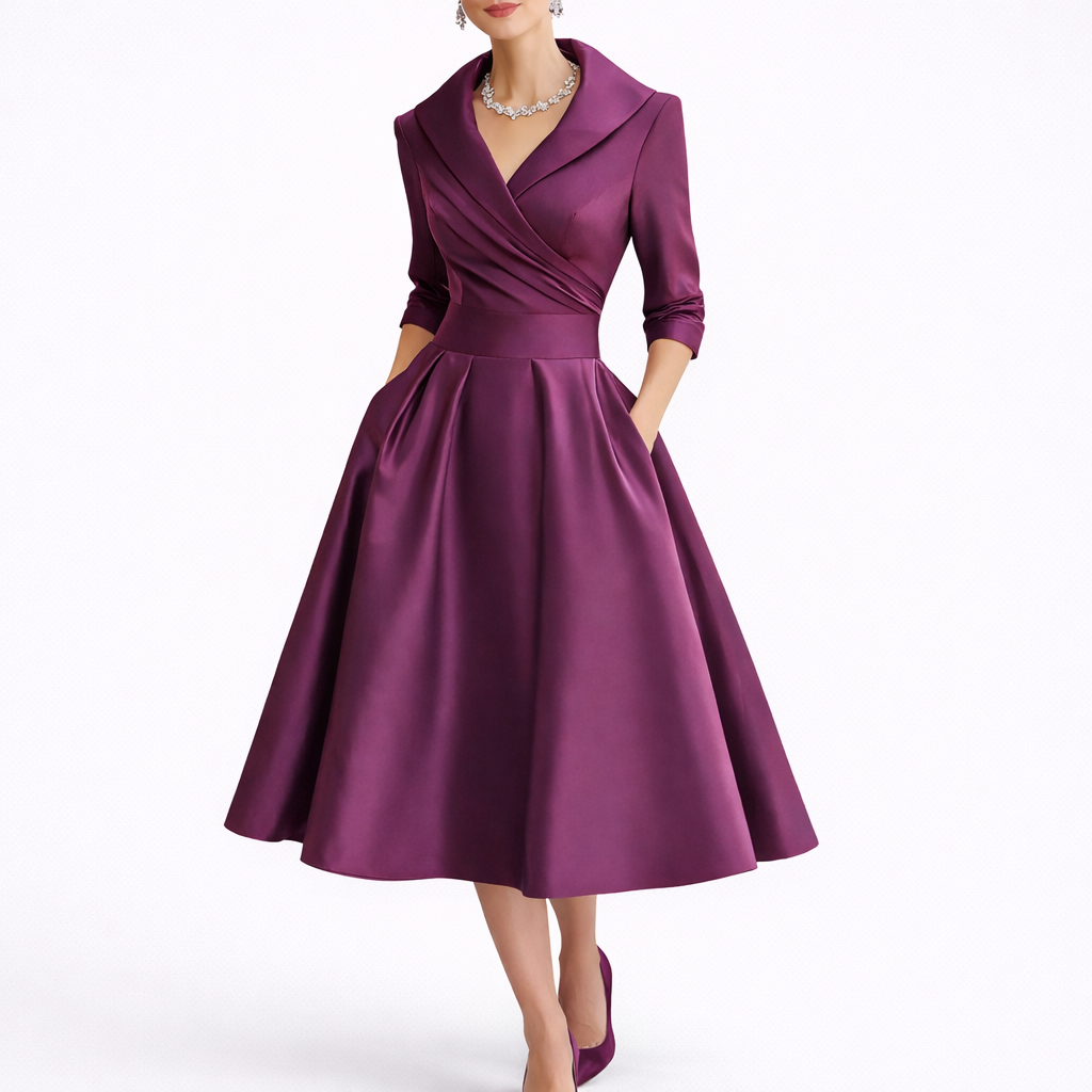 Purple - Woman wearing a structured A-line midi dress with a wide portrait collar, wrap bodice, 3/4 sleeves, and a full pleated skirt with pockets.
