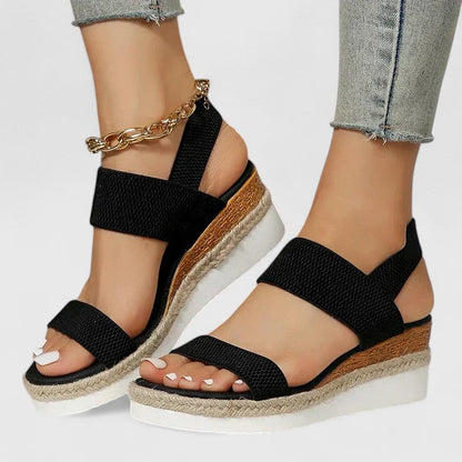 Black - Stretch-fabric open-toe platform sandals featuring a cushioned footbed and textured jute-trim midsole.