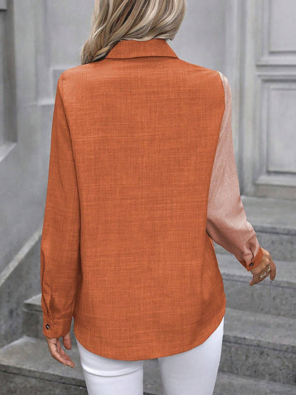 Peach Orange - Women's light green long-sleeve button-down blouse with a collar and textured weave, styled tucked into white trousers.