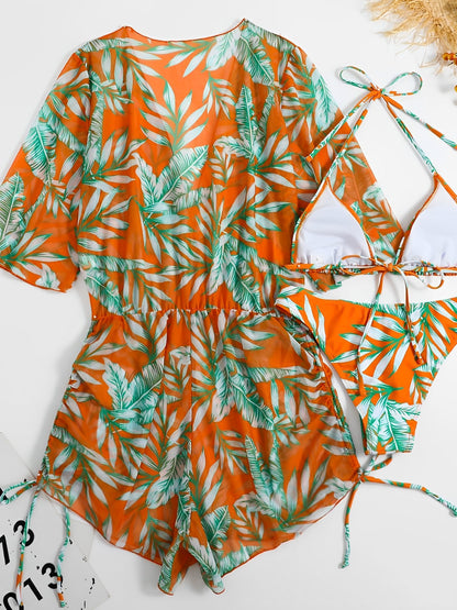 Orange - A woman models a sheer, short-sleeve mini cover-up with a vibrant tropical leaf print in shades of purple, blue, and pink, featuring a deep V-neck, drawstring waist, and ruched sides with ties.