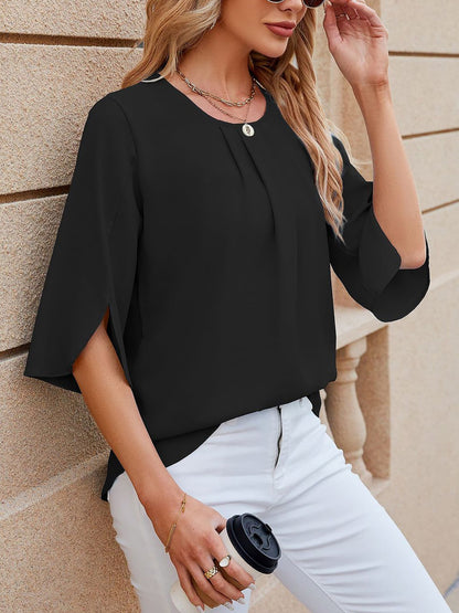 Black - Women's light blue relaxed fit blouse featuring a pleated front neckline and short split sleeves, styled with white trousers.