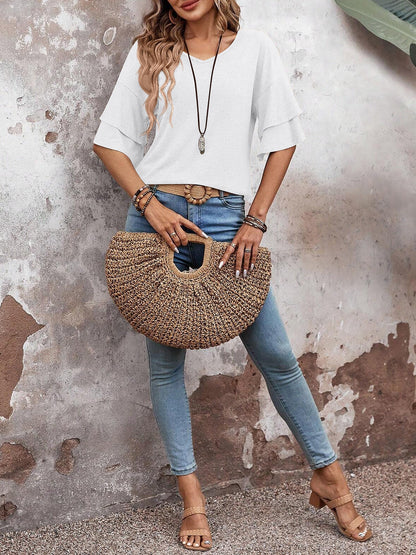 White - Women's solid pink V-neck blouse featuring tiered ruffle short sleeves, styled with blue jeans and a long pendant necklace.