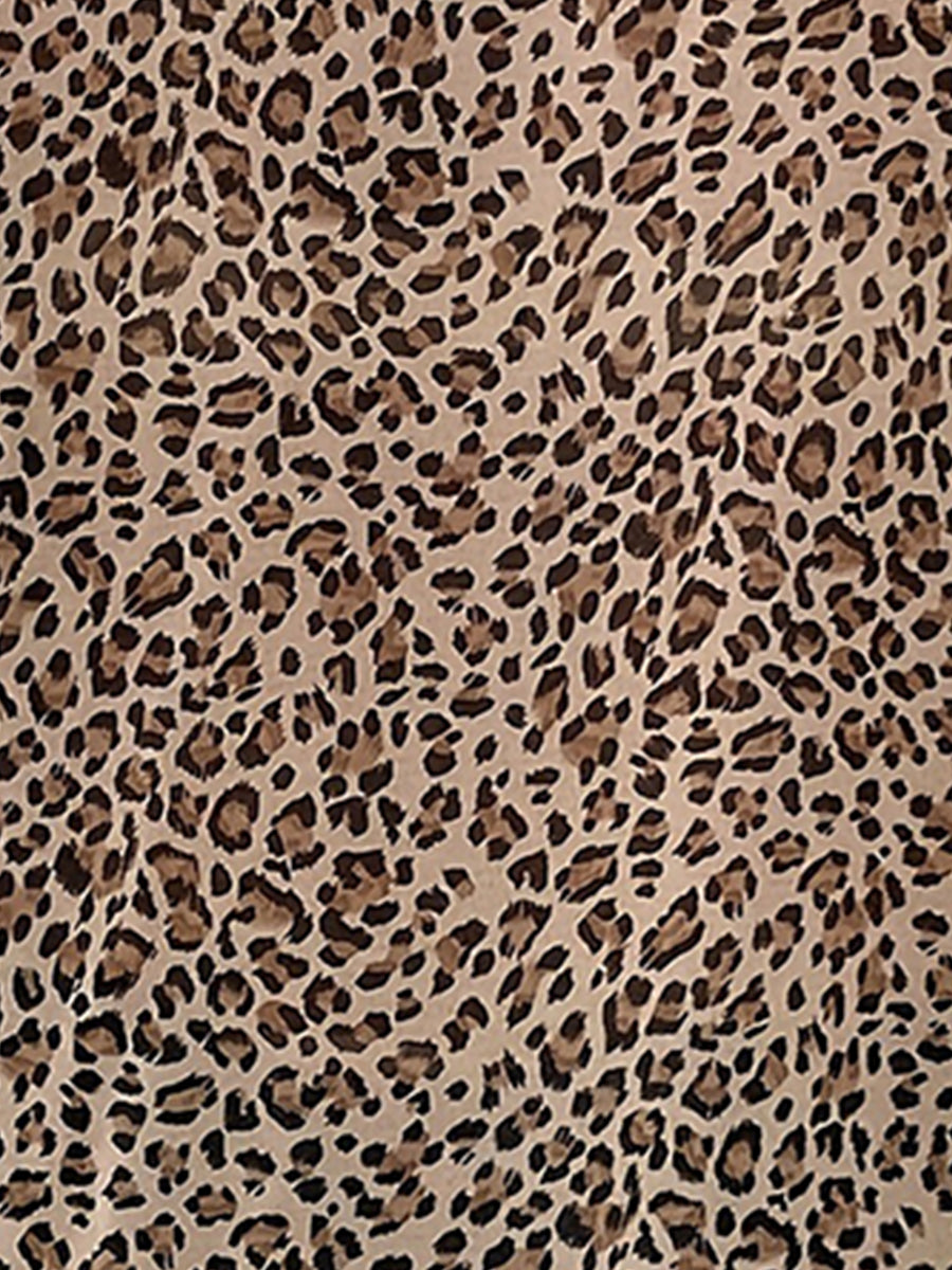 Leopard - Women's sleeveless V-neck blouse featuring a cascading front ruffle and an all-over leopard print.