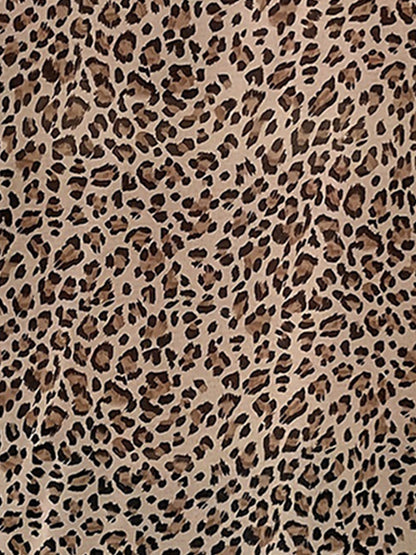 Leopard - Women's sleeveless V-neck blouse featuring a cascading front ruffle and an all-over leopard print.