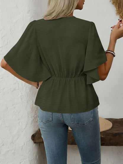 Army Green - Women's rust orange short flutter sleeve blouse featuring a V-neckline, fabric-covered button front, and a tailored peplum waist, styled with blue jeans.