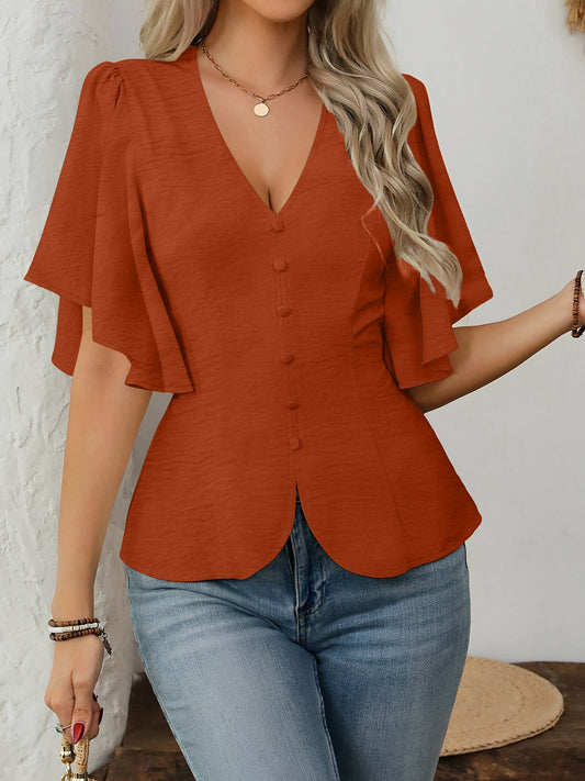Brown - Women's rust orange short flutter sleeve blouse featuring a V-neckline, fabric-covered button front, and a tailored peplum waist, styled with blue jeans.