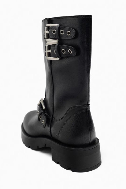 Black - A pair of women's dark brown faux leather mid-calf moto boots featuring three adjustable buckle straps and a chunky black lug sole.