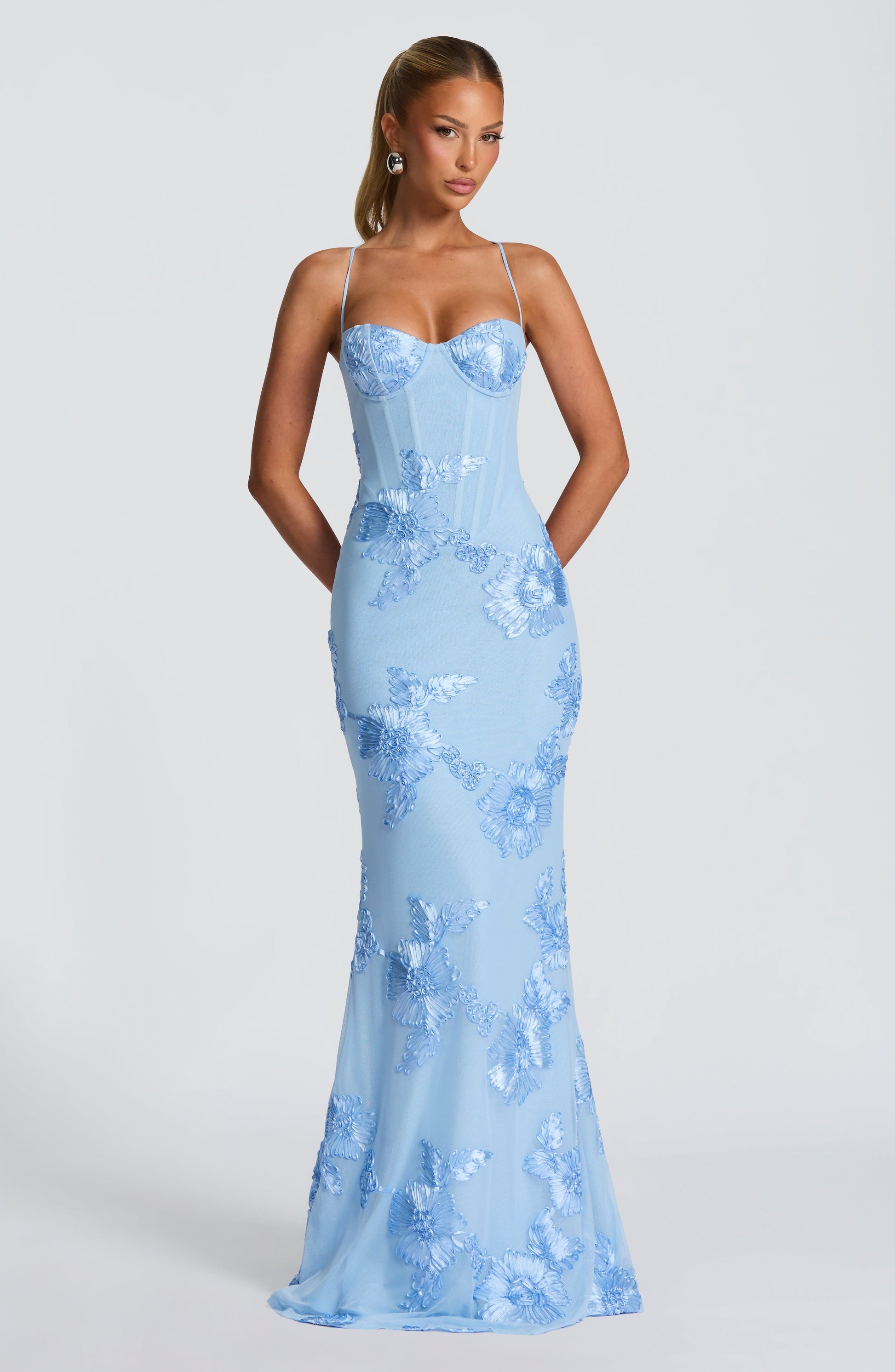 Light Blue - Women's pale yellow formal floor-length gown featuring a structured corset bodice, delicate spaghetti straps, and a sheer overlay embellished with intricate 3D floral appliques.