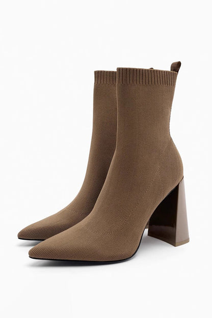 Black - Women's black ribbed knit ankle sock boots featuring a pointed toe and a shiny block heel.