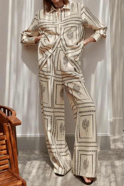 Beige - Women's matching two-piece set featuring a long-sleeve button-down shirt and pants in a light fabric with a dark graphic cactus and geometric border print.