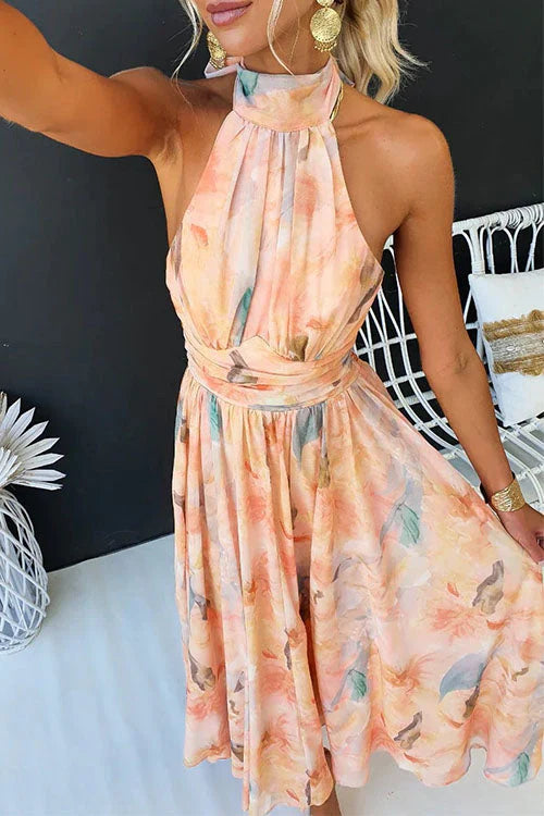 Multicolor - Women's elegant halter neck maxi dress featuring a wide ruched waistband and a flowing skirt in a pastel watercolor floral print.