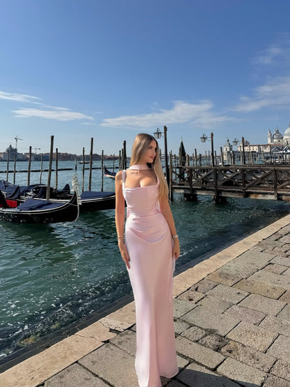 White - Women's elegant olive green satin slip dress featuring a cowl neckline, ruched bodice, wide straps, and a matching neck scarf detail, styled for a formal event.